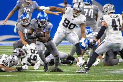 Oct 30, 2023; Detroit, Michigan, USA; Detroit Lions running back Jahmyr Gibbs (26) runs with the ball against the Las Vegas Raiders during the first half at Ford Field. Mandatory Credit: David Reginek-USA TODAY Sports