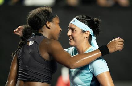 Oct 30, 2023; Cancun, Mexico;  Coco Gauff (USA) and Ons Jabeur (TUN) hug at the net after their match on day two of the GNP Saguaros WTA Finals Cancun. Mandatory Credit: Susan Mullane-USA TODAY Sports