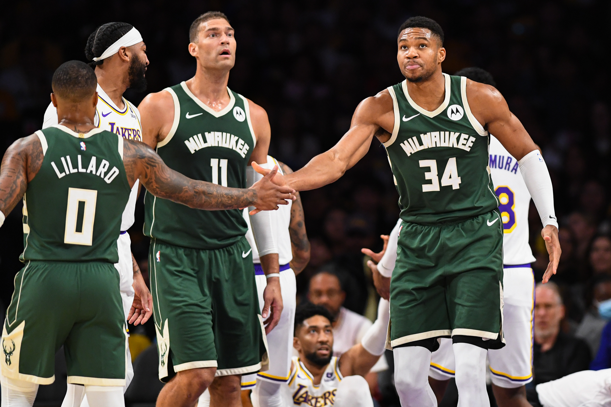 Damian Lillard says he can help the Bucks on defense while embracing  championship expectations