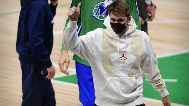 Dallas Mavericks guard Luka Doncic (77) gives a thumbs up to the crowd as he walks off the court after the game between the Dallas Mavericks and the Oklahoma City Thunder at the American Airlines Center. Mandatory Credit: Jerome Miron-USA TODAY Sports