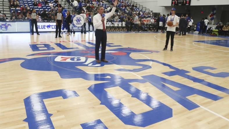 Gov. John Carney stands on the Delaware Blue Coats'  Caesar Rodney logo at the opening of Wilmington's Chase Fieldhouse in 2019. The logo has since been discontinued.

Blue Coats Open Field House