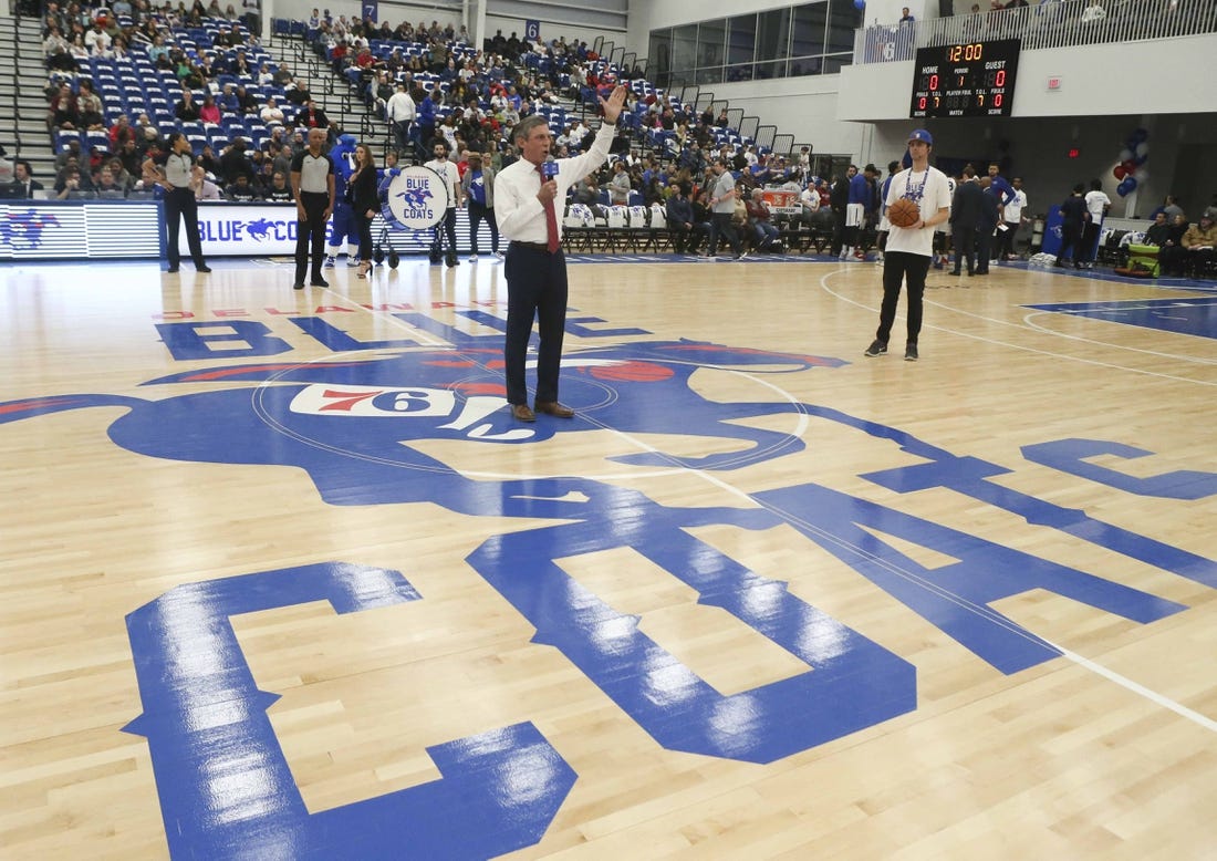 Gov. John Carney stands on the Delaware Blue Coats'  Caesar Rodney logo at the opening of Wilmington's Chase Fieldhouse in 2019. The logo has since been discontinued.

Blue Coats Open Field House