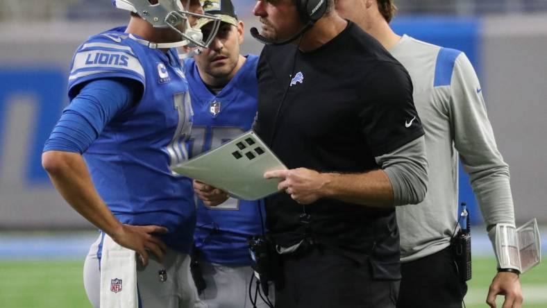 Detroit Lions quarterback Jared Goff (16) and head coach Dan Campbell talk on the sidelines during first half action against the Philadelphia Eagles at Ford Field on Sunday, Oct. 31, 2021.

Detroit Lions