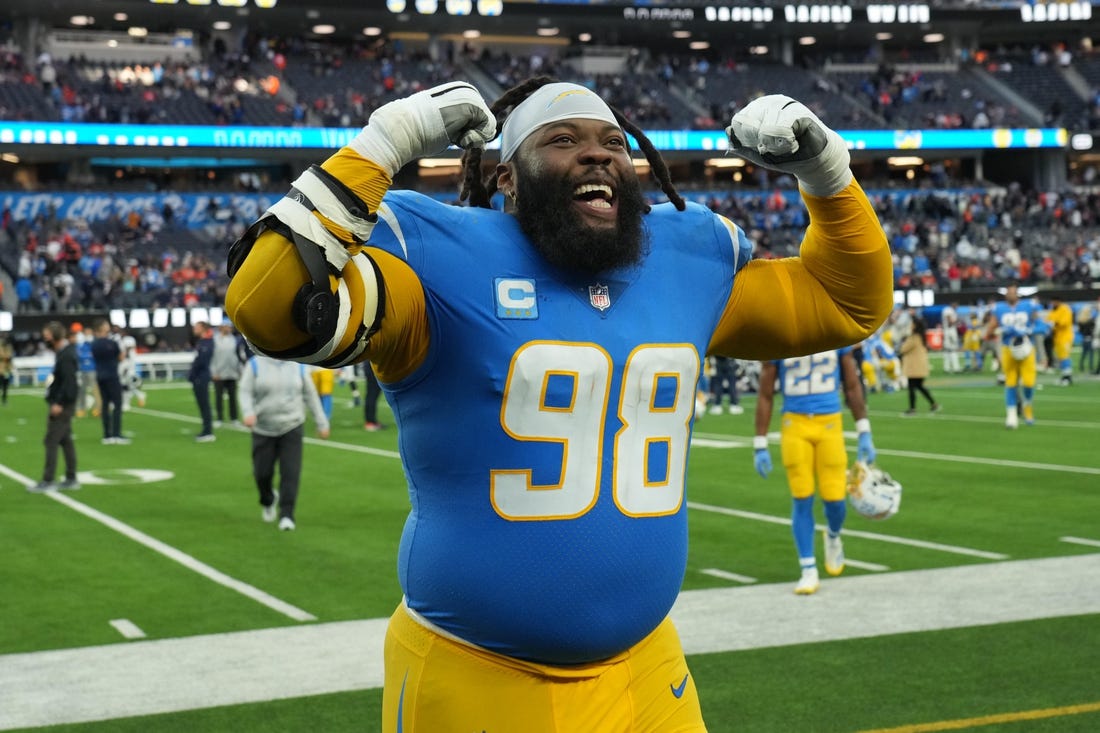 Jan 2, 2022; Inglewood, California, USA; Los Angeles Chargers defensive tackle Linval Joseph (98) celebrates after the game against the Denver Broncos at SoFi Stadium. Mandatory Credit: Kirby Lee-USA TODAY Sports