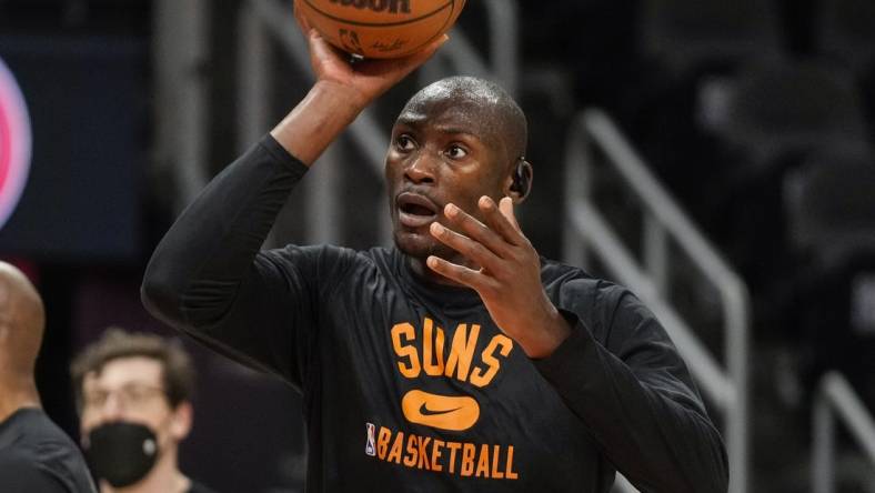 Feb 3, 2022; Atlanta, Georgia, USA; Phoenix Suns center Bismack Biyombo (18) warms up on the court prior to the game against the Atlanta Hawks at State Farm Arena. Mandatory Credit: Dale Zanine-USA TODAY Sports