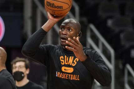 Feb 3, 2022; Atlanta, Georgia, USA; Phoenix Suns center Bismack Biyombo (18) warms up on the court prior to the game against the Atlanta Hawks at State Farm Arena. Mandatory Credit: Dale Zanine-USA TODAY Sports