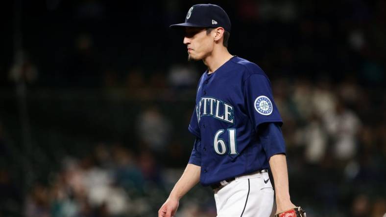 May 7, 2022; Seattle, Washington, USA;  Seattle Mariners relief pitcher Riley O'Brien (61) walks off the field after pitching in the ninth inning against the Tampa Bay Rays at T-Mobile Park. Mandatory Credit: Lindsey Wasson-USA TODAY Sports