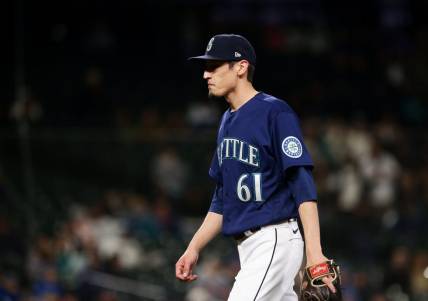 May 7, 2022; Seattle, Washington, USA;  Seattle Mariners relief pitcher Riley O'Brien (61) walks off the field after pitching in the ninth inning against the Tampa Bay Rays at T-Mobile Park. Mandatory Credit: Lindsey Wasson-USA TODAY Sports