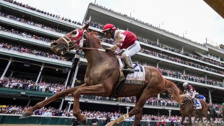 Rich Strike, with Sonny Leon up, runs down the field to win the 148th running of the Kentucky Derby on Saturday, May 7, 2022

Derbymsc18