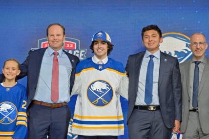 Jul 7, 2022; Montreal, Quebec, CANADA; Matthew Savoie after being selected as the number nine overall pick to the Buffalo Sabres in the first round of the 2022 NHL Draft at Bell Centre. Mandatory Credit: Eric Bolte-USA TODAY Sports