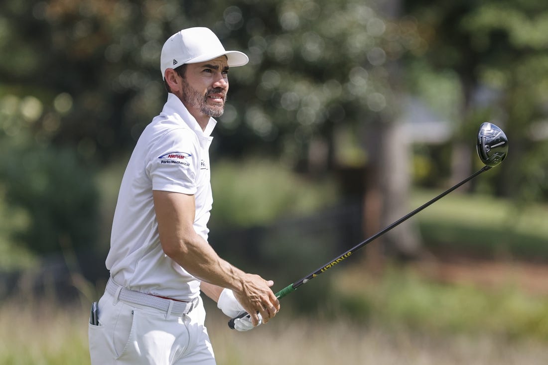 Aug 5, 2022; Greensboro, North Carolina, USA; Camilo Villegas watches his shot off the 9th tee box during the second round of the Wyndham Championship golf tournament. Mandatory Credit: Nell Redmond-USA TODAY Sports