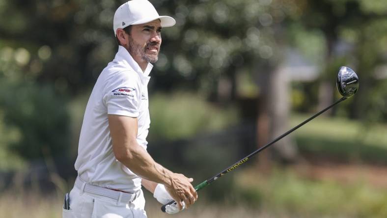 Aug 5, 2022; Greensboro, North Carolina, USA; Camilo Villegas watches his shot off the 9th tee box during the second round of the Wyndham Championship golf tournament. Mandatory Credit: Nell Redmond-USA TODAY Sports