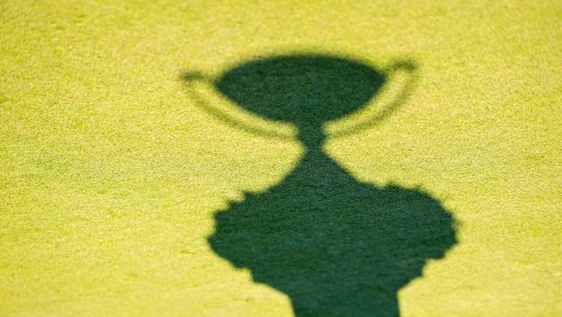 Aug 28, 2022; Atlanta, Georgia, USA; General view of the FedEx Cup trophy   s shadow after the final round of the TOUR Championship golf tournament. Mandatory Credit: Adam Hagy-USA TODAY Sports