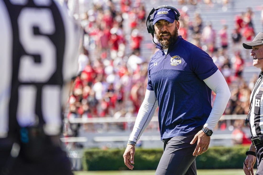 Sep 24, 2022; Athens, Georgia, USA; Kent State Golden Flashes head coach Sean Lewis on the field during a time out against the Georgia Bulldogs during the second half at Sanford Stadium. Mandatory Credit: Dale Zanine-USA TODAY Sports