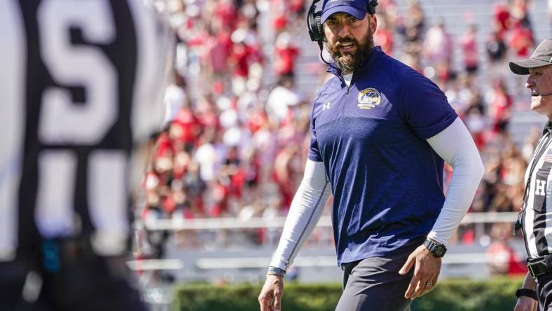 Sep 24, 2022; Athens, Georgia, USA; Kent State Golden Flashes head coach Sean Lewis on the field during a time out against the Georgia Bulldogs during the second half at Sanford Stadium. Mandatory Credit: Dale Zanine-USA TODAY Sports