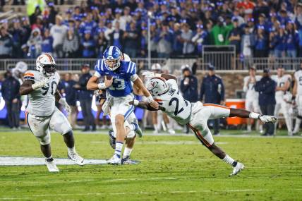 Duke Blue Devils quarterback Riley Leonard had three total TDs to beat the Virginia Cavaliers last season, but his status for Saturday's game is up in the air. Mandatory Credit: Jaylynn Nash-USA TODAY Sports