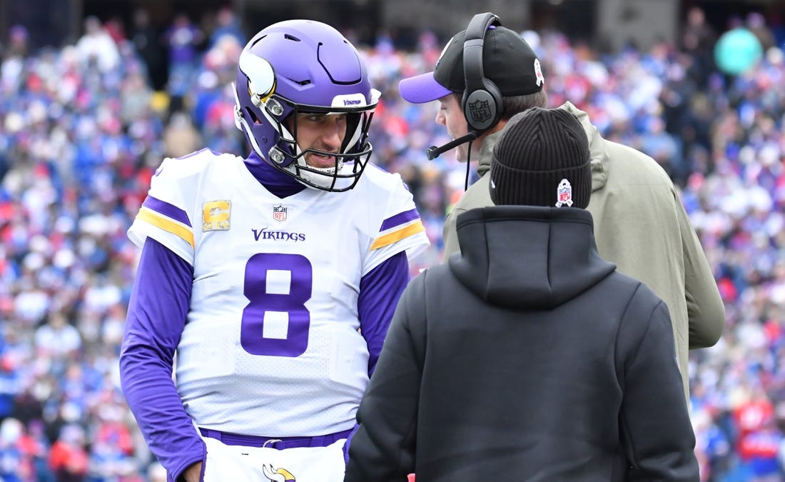 Nov 13, 2022; Orchard Park, New York, USA; Minnesota Vikings quarterback Kirk Cousins (8) gets instrucyion from head coach Kevin O'Connell in the first quarter game against the Buffalo Bills at Highmark Stadium. Mandatory Credit: Mark Konezny-USA TODAY Sports