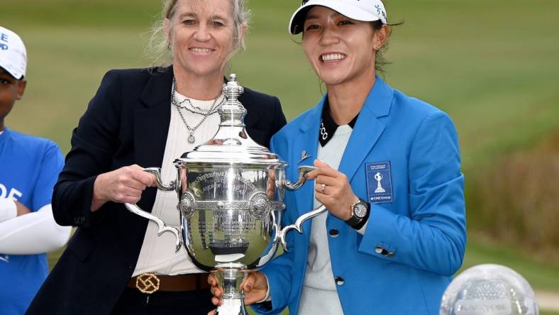 Lydia Ko with LPGA commissioner Mollie Marcoux Samaan being award the player of the year trophy after winning the 2022 CME Group Tour Golf Championship at the Tiburon Golf Club in Naples, Fla., Sunday, Nov. 20, 2022.  (Chris Tilley)

Lpga 3