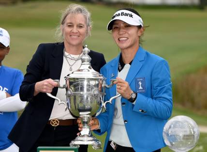 Lydia Ko with LPGA commissioner Mollie Marcoux Samaan being award the player of the year trophy after winning the 2022 CME Group Tour Golf Championship at the Tiburon Golf Club in Naples, Fla., Sunday, Nov. 20, 2022.  (Chris Tilley)

Lpga 3