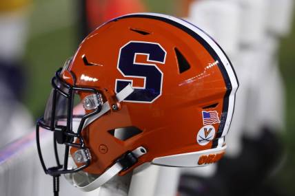 Nov 26, 2022; Chestnut Hill, Massachusetts, USA; The logo of the Syracuse Orange is seen on a helmet during the second half of their game against the Boston College Eagles at Alumni Stadium. Mandatory Credit: Winslow Townson-USA TODAY Sports