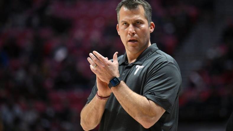 Dec 5, 2022; San Diego, California, USA; Troy Trojans head coach Scott Cross looks on during the first half against the San Diego State Aztecs at Viejas Arena. Mandatory Credit: Orlando Ramirez-USA TODAY Sports