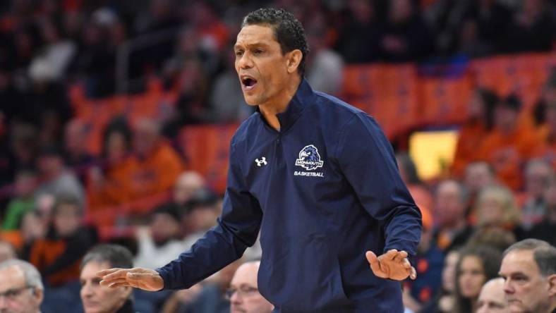 Dec 12, 2022; Syracuse, New York, USA; Monmouth Hawks head coach King Rice calls out to his team in the first half against the Syracuse Orange at JMA Wireless Dome. Mandatory Credit: Mark Konezny-USA TODAY Sports