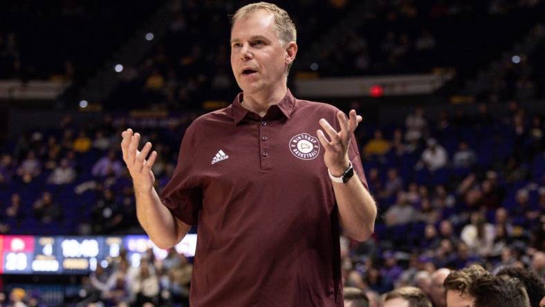 Dec 17, 2022; Baton Rouge, Louisiana, USA;  Winthrop Eagles head coach Mark Prosser reacts during the first half against the LSU Tigers at Pete Maravich Assembly Center. Mandatory Credit: Stephen Lew-USA TODAY Sports