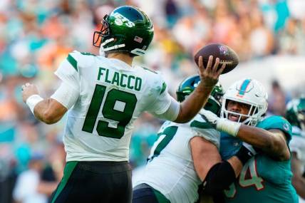 Jan 8, 2023; Miami Gardens, Florida, USA; New York Jets quarterback Joe Flacco (19) throws a pass against the New York Jets during the second half at Hard Rock Stadium. Mandatory Credit: Rich Storry-USA TODAY Sports