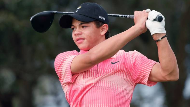 Dec 17, 2022; Orlando, Florida, USA;  Charlie woods hits his tee shot on the 10th hole during the first round of the PNC Championship golf tournament at Ritz Carlton Golf Club Grande Lakes Orlando Course. Mandatory Credit: Reinhold Matay-USA TODAY Sports