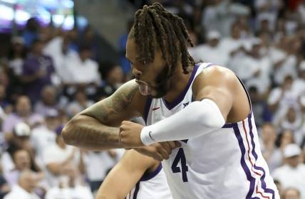 Feb 20, 2023; Fort Worth, Texas, USA;  TCU Horned Frogs center Eddie Lampkin Jr. (4) reacts during the second half against the Kansas Jayhawks at Ed and Rae Schollmaier Arena. Mandatory Credit: Kevin Jairaj-USA TODAY Sports