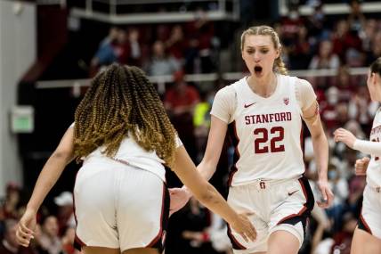 Feb 20, 2023; Stanford, California, USA;  Stanford Cardinal forward Cameron Brink (22) is congratulated by guard Haley Jones (30) after scoring against the UCLA Bruins during the second half at Maples Pavilion. Mandatory Credit: John Hefti-USA TODAY Sports