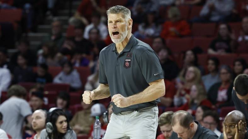 Feb 21, 2023; Norman, Oklahoma, USA; Oklahoma Sooners head coach Porter Moser reacts after a play against the Texas Tech Red Raiders during the first half at Lloyd Noble Center. Mandatory Credit: Alonzo Adams-USA TODAY Sports