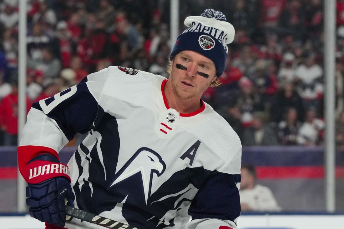 Feb 18, 2023; Raleigh, North Carolina, USA; Washington Capitals center Nicklas Backstrom (19) skates during the warmups before the game against the Carolina Hurricanes during the 2023 Stadium Series ice hockey game at Carter-Finley Stadium. Mandatory Credit: James Guillory-USA TODAY Sports