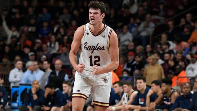 Feb 22, 2023; Chestnut Hill, Massachusetts, USA; Boston College Eagles forward Quinten Post (12) reacts against the Virginia Cavaliers during the first half at Conte Forum. Mandatory Credit: Eric Canha-USA TODAY Sports