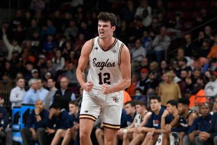 Feb 22, 2023; Chestnut Hill, Massachusetts, USA; Boston College Eagles forward Quinten Post (12) reacts against the Virginia Cavaliers during the first half at Conte Forum. Mandatory Credit: Eric Canha-USA TODAY Sports