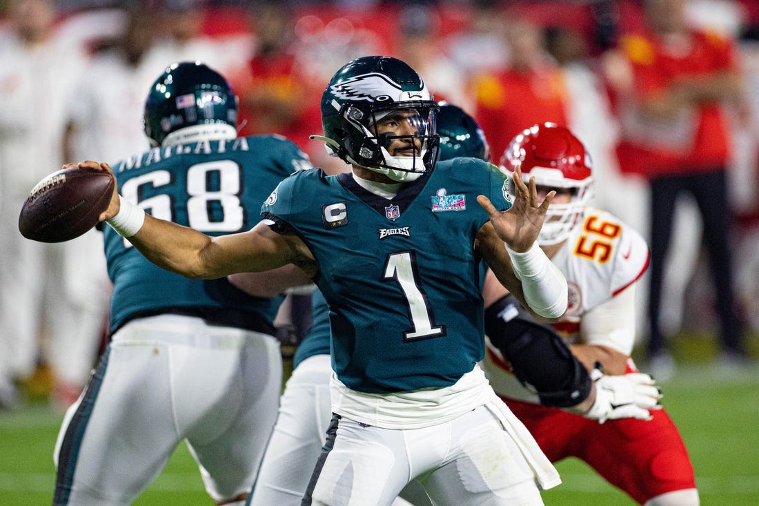 Feb 12, 2023; Glendale, Arizona, US; Philadelphia Eagles quarterback Jalen Hurts (1) throws the ball against the Kansas City Chiefs in Super Bowl LVII at State Farm Stadium. Mandatory Credit: Bill Streicher-USA TODAY Sports