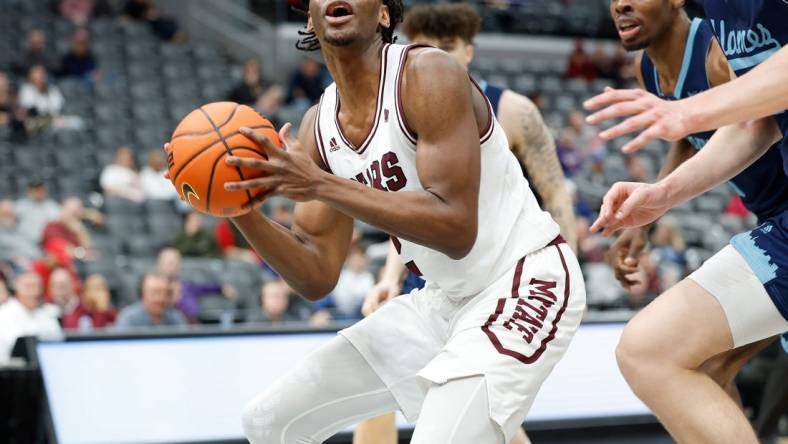 Missouri State's Jonathan Mogbo (2) looks for a shot during a Missouri Valley Conference Tournament game against UIC, Thursday, March 2, 2023, at Enterprise Center in St. Louis.

Mvc Tournament Missouri State V Uic