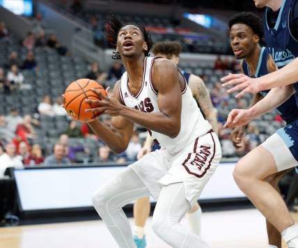 Missouri State's Jonathan Mogbo (2) looks for a shot during a Missouri Valley Conference Tournament game against UIC, Thursday, March 2, 2023, at Enterprise Center in St. Louis.

Mvc Tournament Missouri State V Uic
