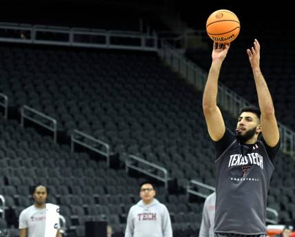 Texas Tech's forward Fardaws Aimaq (11) shoots the ball during practice ahead of the Big 12 basketball tournament, Tuesday, March 7, 2023, at T-Mobile Center in Kansas City.