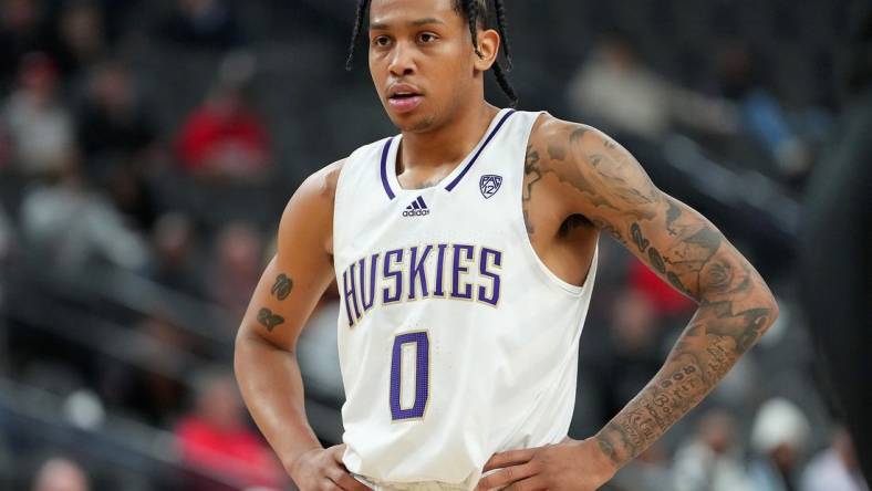 Mar 8, 2023; Las Vegas, NV, USA; Washington Huskies guard Koren Johnson (0) awaits a free throw attempt against the Colorado Buffaloes during the first half at T-Mobile Arena. Mandatory Credit: Stephen R. Sylvanie-USA TODAY Sports