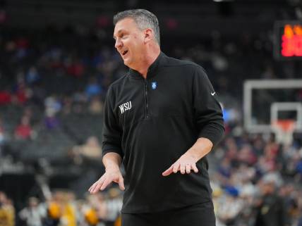 Mar 8, 2023; Las Vegas, NV, USA; Washington State Cougars head coach Kyle Smith talks to an official before a free throw attempt by the California Golden Bears during the first half at T-Mobile Arena. Mandatory Credit: Stephen R. Sylvanie-USA TODAY Sports