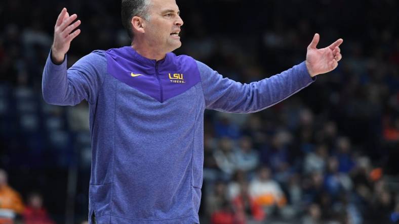 Mar 8, 2023; Nashville, TN, USA; LSU Tigers head coach Matt McMahon reacts after a call by the officials during the first half against the Georgia Bulldogs at Bridgestone Arena. Mandatory Credit: Christopher Hanewinckel-USA TODAY Sports