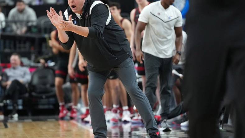 Mar 8, 2023; Las Vegas, NV, USA; Stanford Cardinal head coach Jerod Haase applauds a play against the Utah Utes during the second half at T-Mobile Arena. Mandatory Credit: Stephen R. Sylvanie-USA TODAY Sports