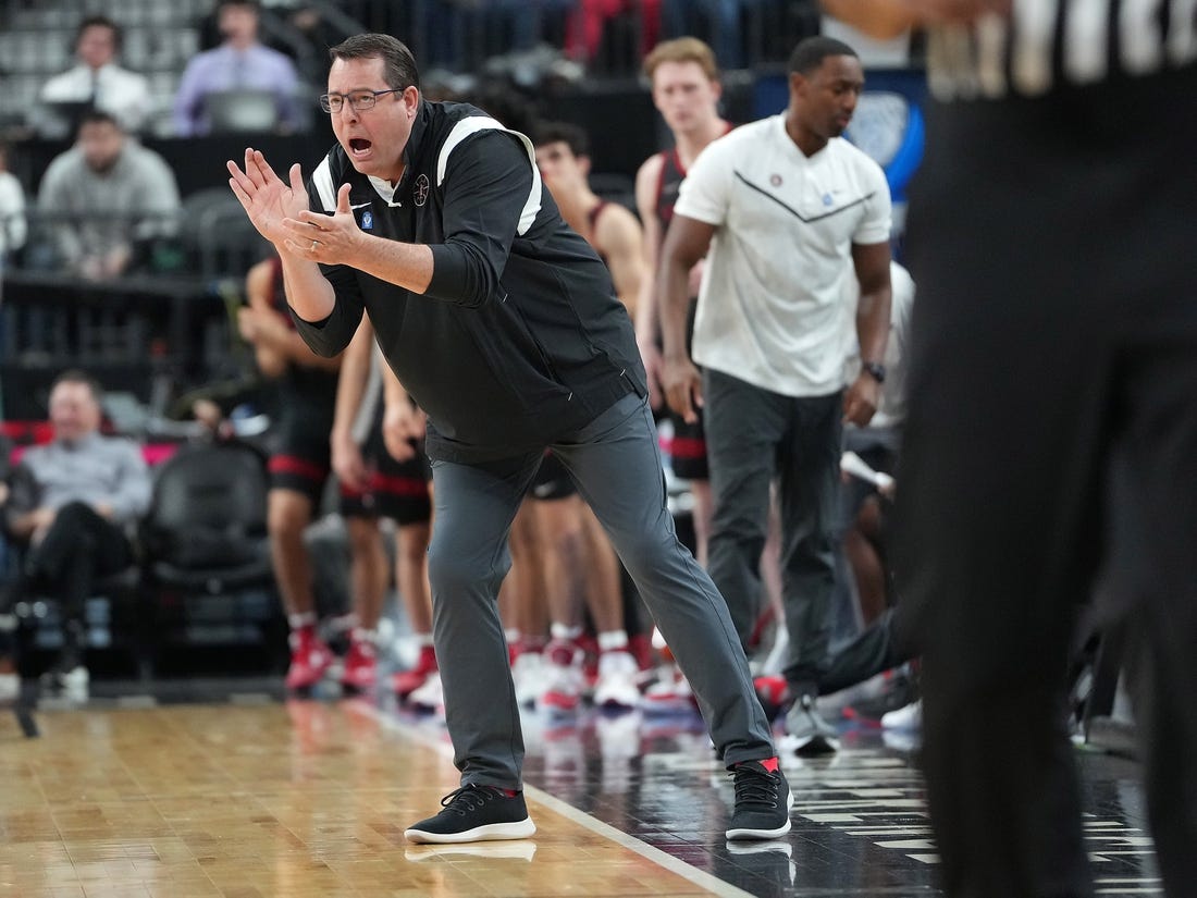Mar 8, 2023; Las Vegas, NV, USA; Stanford Cardinal head coach Jerod Haase applauds a play against the Utah Utes during the second half at T-Mobile Arena. Mandatory Credit: Stephen R. Sylvanie-USA TODAY Sports