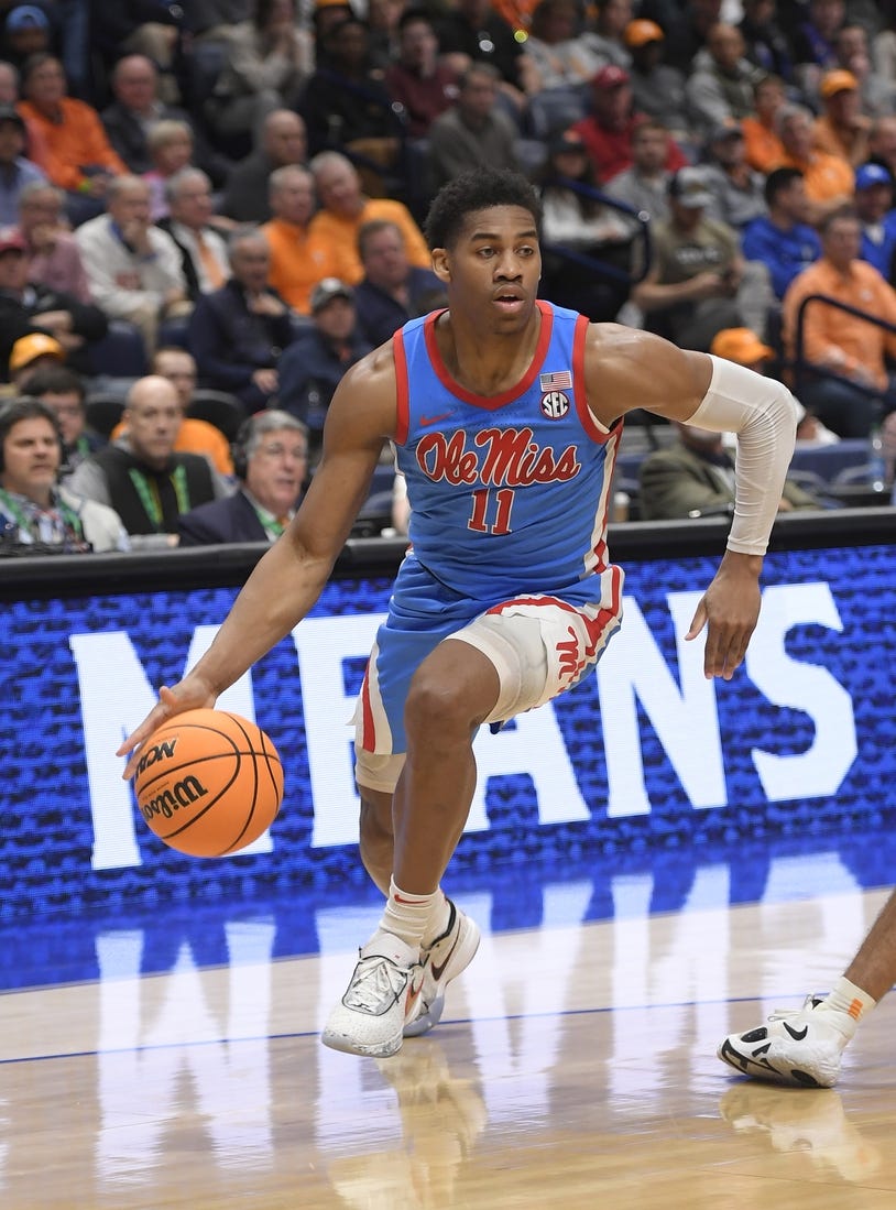 Mar 9, 2023; Nashville, TN, USA;  Mississippi Rebels guard Matthew Murrell (11) dribbles baseline against the Tennessee Volunteers during the first half at Bridgestone Arena. Mandatory Credit: Steve Roberts-USA TODAY Sports