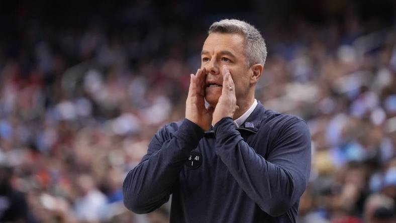 Mar 9, 2023; Greensboro, NC, USA; Virginia Cavaliers head coach Tony Bennett reacts in the second half of the quarterfinals of the ACC tournament at Greensboro Coliseum.  Mandatory Credit: Bob Donnan-USA TODAY Sports