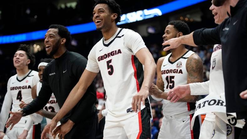 The Georgia bench celebrates a three point basket by Georgia guard Jabri Abdur-Rahim against LSU during the second half of a first round SEC Men   s Basketball Tournament game at Bridgestone Arena Wednesday, March 8, 2023, in Nashville, Tenn.

Sec Basketball Lsu Vs Georgia