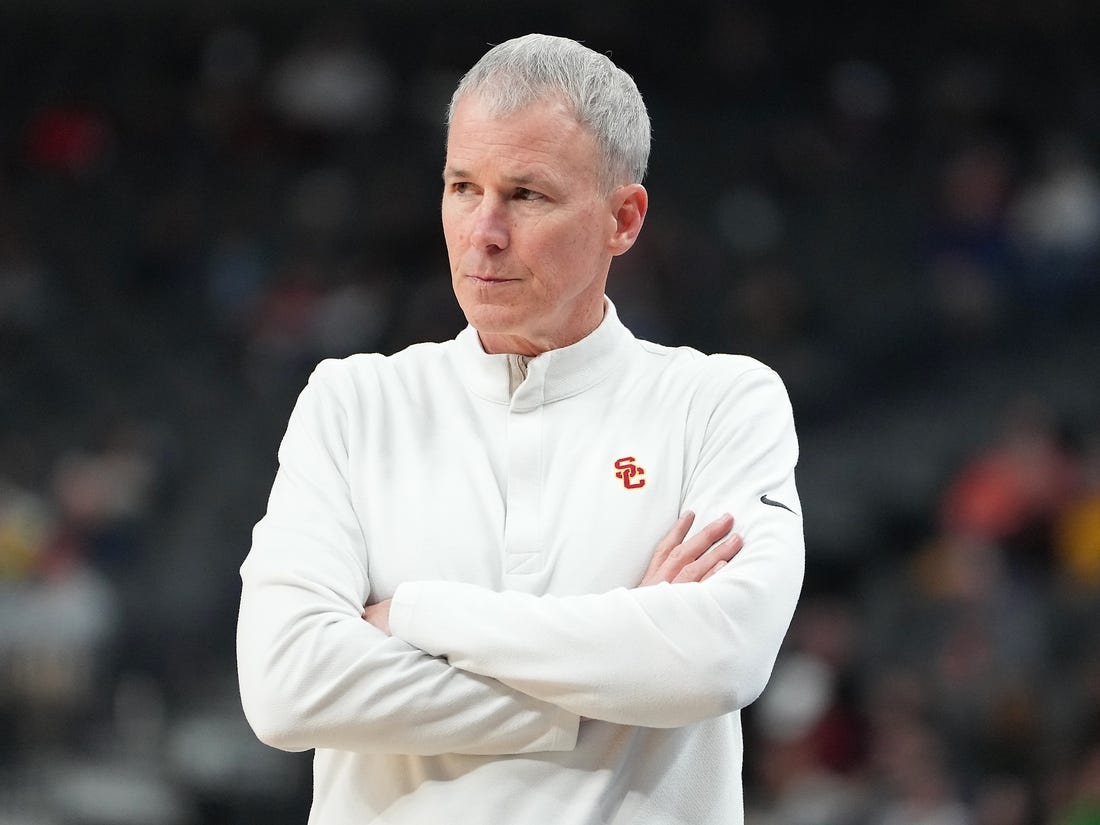 Mar 9, 2023; Las Vegas, NV, USA; USC Trojans head coach Andy Enfield watches play against the Arizona State Sun Devils during the second period at T-Mobile Arena. Mandatory Credit: Stephen R. Sylvanie-USA TODAY Sports