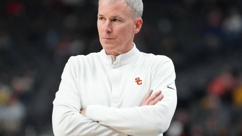 Mar 9, 2023; Las Vegas, NV, USA; USC Trojans head coach Andy Enfield watches play against the Arizona State Sun Devils during the second period at T-Mobile Arena. Mandatory Credit: Stephen R. Sylvanie-USA TODAY Sports