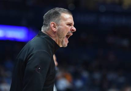 Mar 10, 2023; Nashville, TN, USA; Mississippi State Bulldogs head coach Chris Jans yells from the sideline during the first half against the Alabama Crimson Tide at Bridgestone Arena. Mandatory Credit: Christopher Hanewinckel-USA TODAY Sports